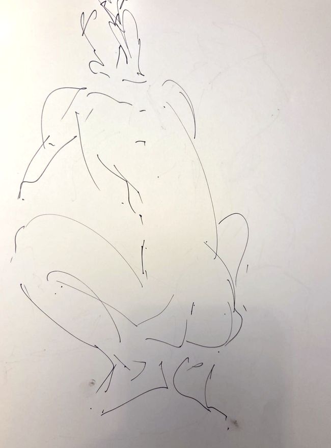 Life drawing of a standing or seated nude male figure, made from life in charcoal and ink.